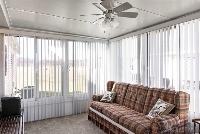 sunroom / solarium with ceiling fan