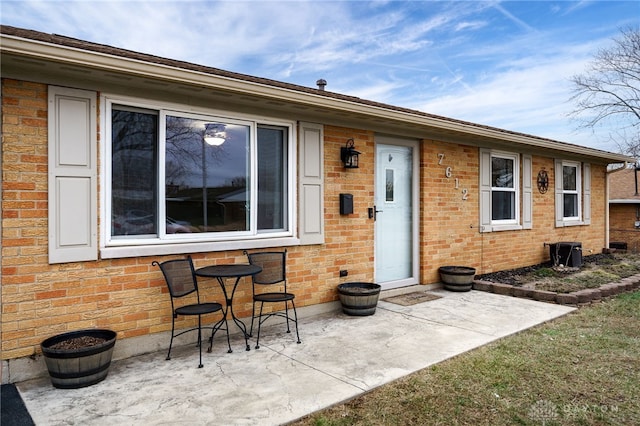 rear view of property with a patio area