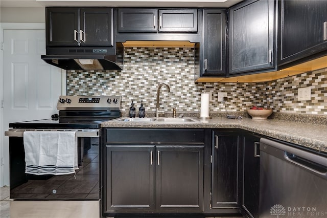 kitchen featuring extractor fan, decorative backsplash, stainless steel appliances, and sink