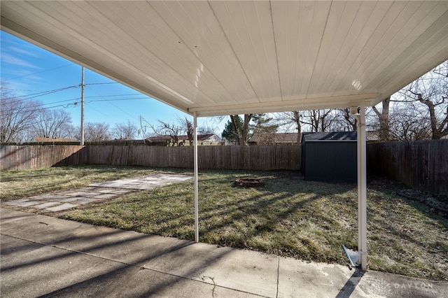 view of patio / terrace with a storage shed