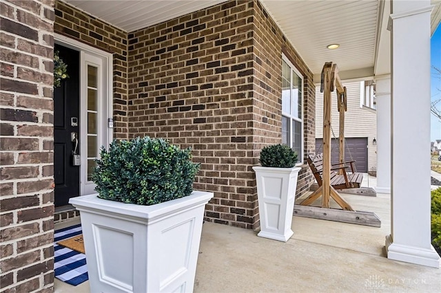 view of patio featuring covered porch