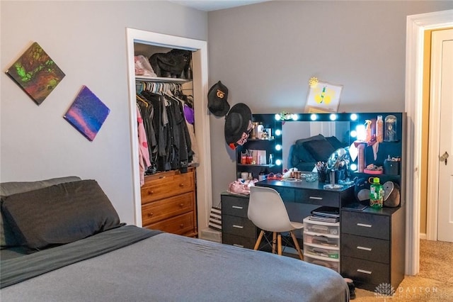 bedroom with carpet flooring and a closet