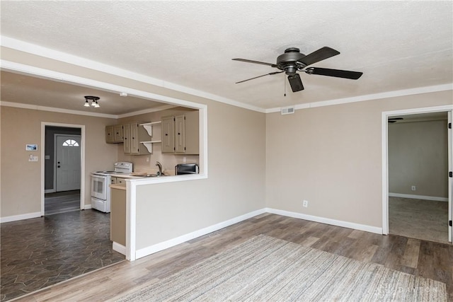 interior space with sink, a textured ceiling, ornamental molding, hardwood / wood-style flooring, and ceiling fan