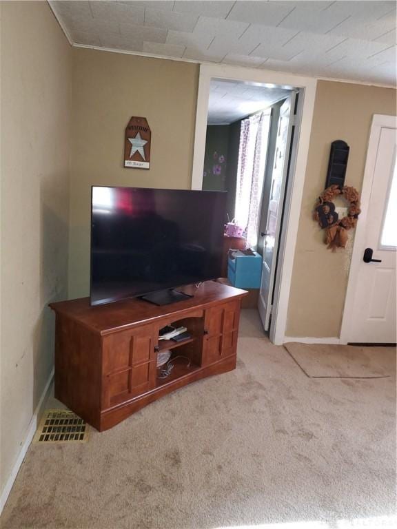 living room with light colored carpet