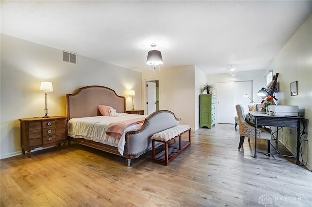 bedroom featuring light wood-type flooring