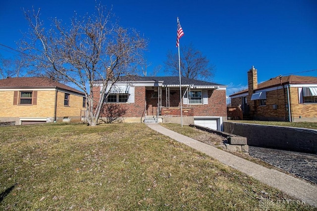 view of front of property with a garage and a front yard