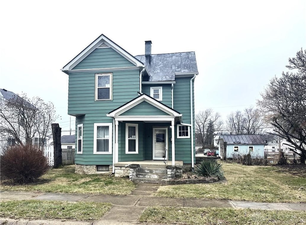 view of front of house with a front lawn