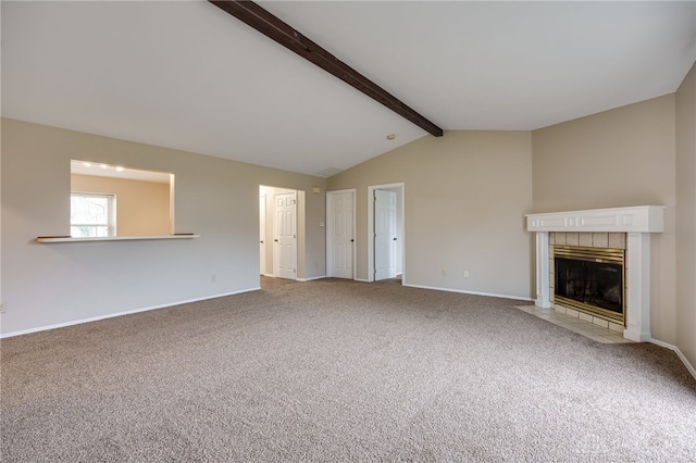 unfurnished living room featuring carpet, vaulted ceiling with beams, and a fireplace