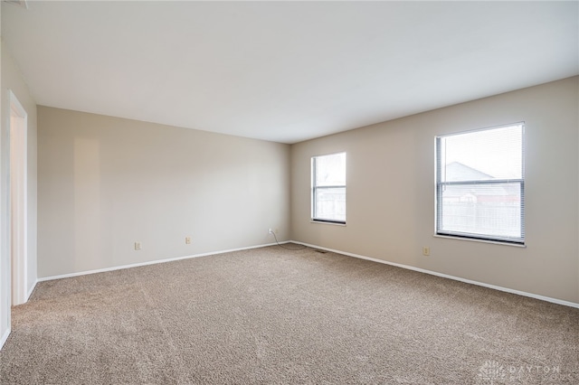 view of carpeted spare room