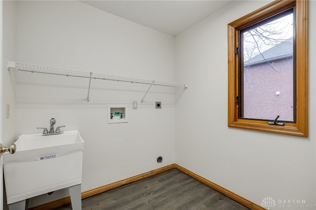 laundry area with washer hookup, dark hardwood / wood-style floors, sink, and electric dryer hookup