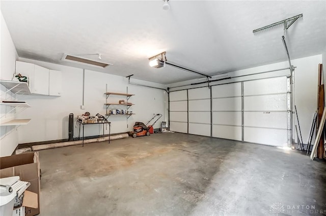 garage featuring a garage door opener