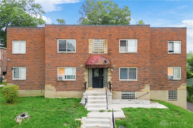 view of front of property with a front lawn