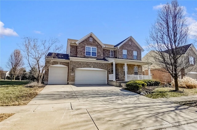 view of front of house featuring a garage and covered porch