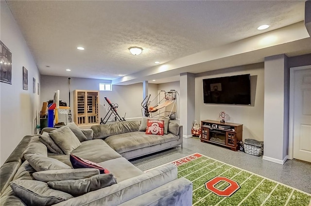 living room with a textured ceiling