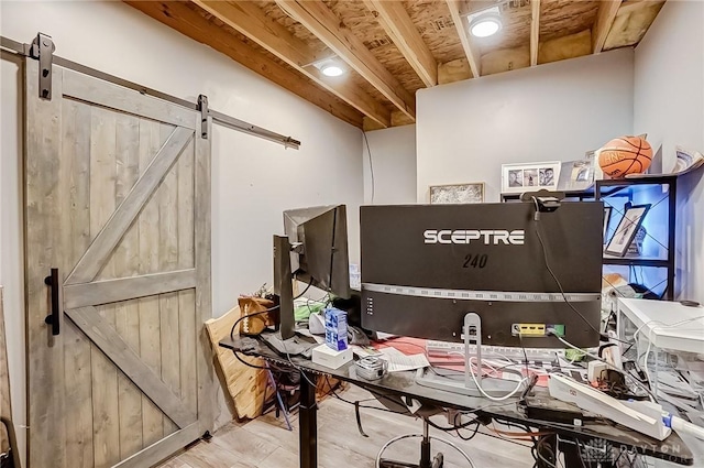 miscellaneous room with a barn door