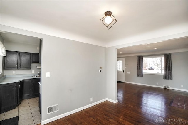 interior space with hardwood / wood-style flooring and sink