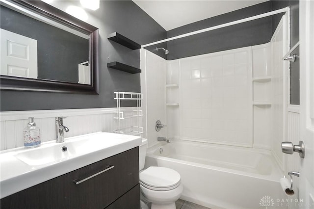 full bathroom with vanity,  shower combination, and toilet