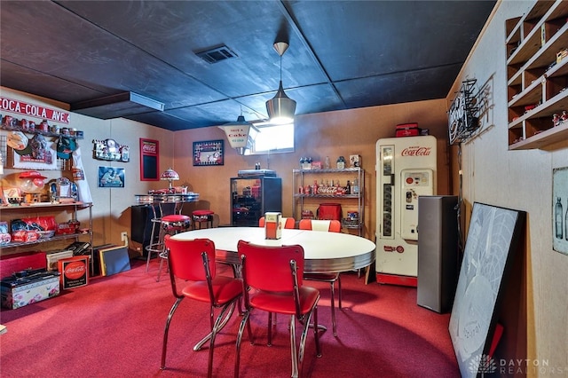 view of carpeted dining room