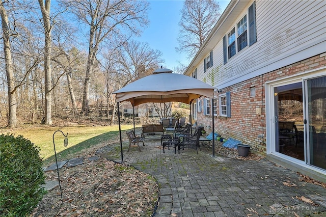 view of patio featuring a gazebo