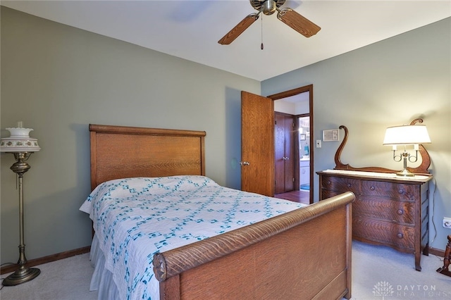 bedroom featuring ceiling fan and light colored carpet