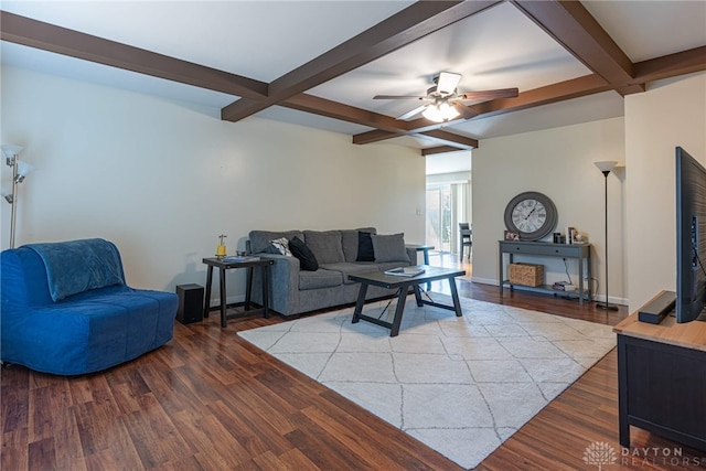 living room with beamed ceiling, ceiling fan, wood-type flooring, and coffered ceiling