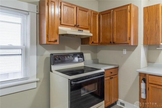 kitchen with black / electric stove