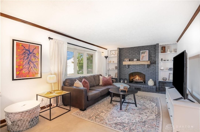 living room featuring crown molding, a brick fireplace, and built in features