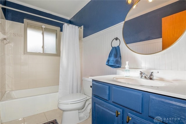 full bathroom with tile patterned floors, toilet, shower / bath combo with shower curtain, and vanity