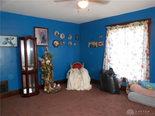 bedroom with ceiling fan and carpet flooring