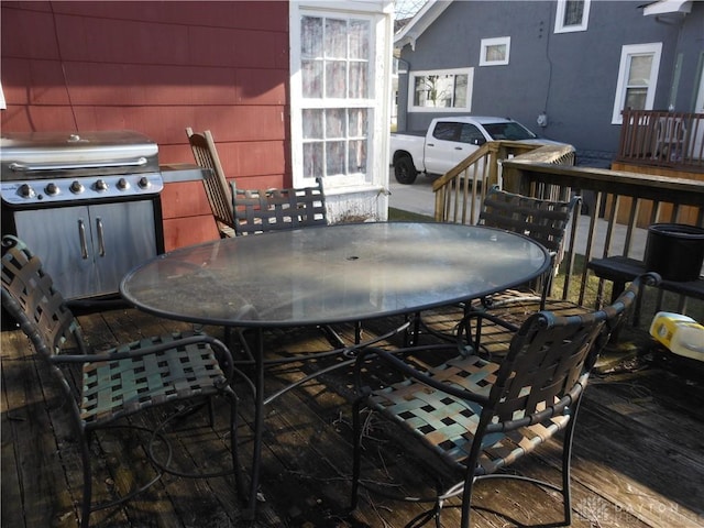 wooden deck featuring grilling area