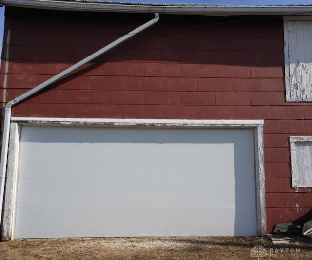 view of side of property with a garage