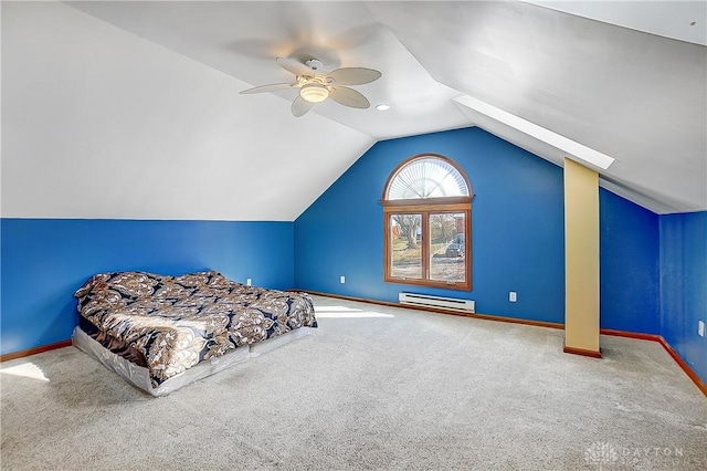 unfurnished bedroom with lofted ceiling, carpet flooring, baseboards, and baseboard heating