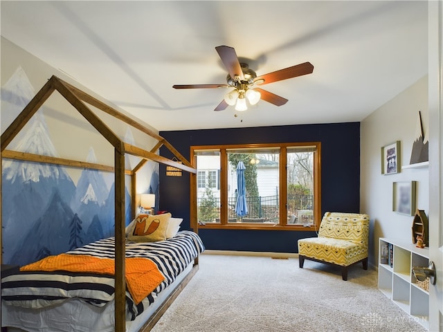 carpeted bedroom with ceiling fan