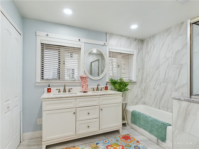 bathroom with vanity and plus walk in shower