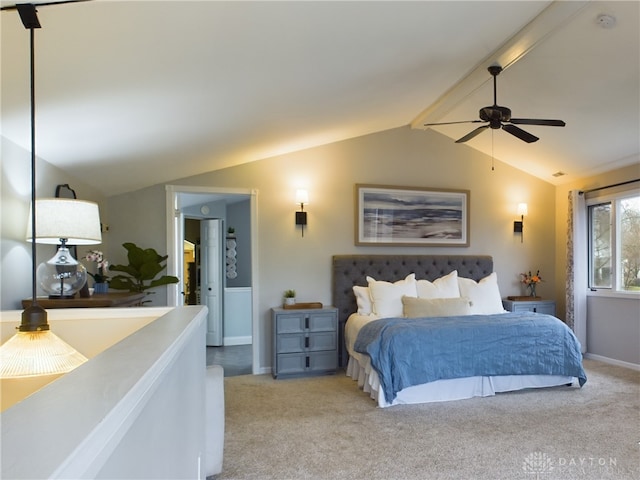 carpeted bedroom featuring vaulted ceiling with beams and ceiling fan