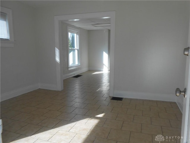 empty room featuring light tile patterned floors