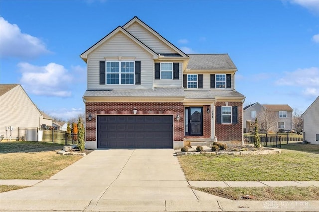 view of front of house with a garage and a front lawn