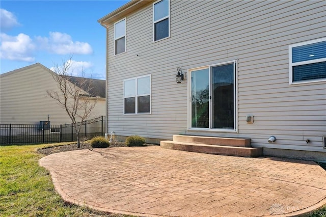 back of property featuring a patio area