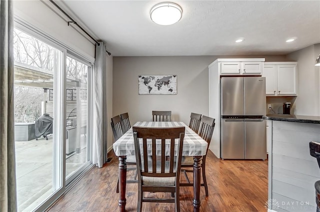 dining area featuring hardwood / wood-style flooring