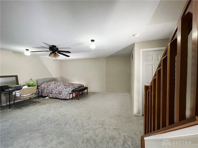 bedroom with ceiling fan and carpet