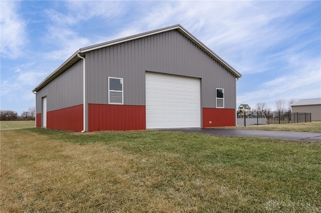 garage with a yard