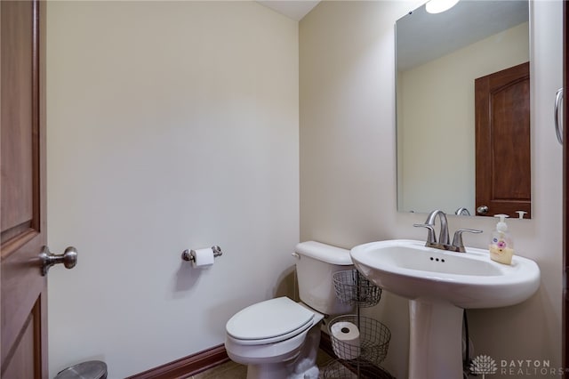 bathroom with sink and toilet