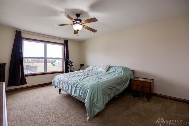 carpeted bedroom with ceiling fan