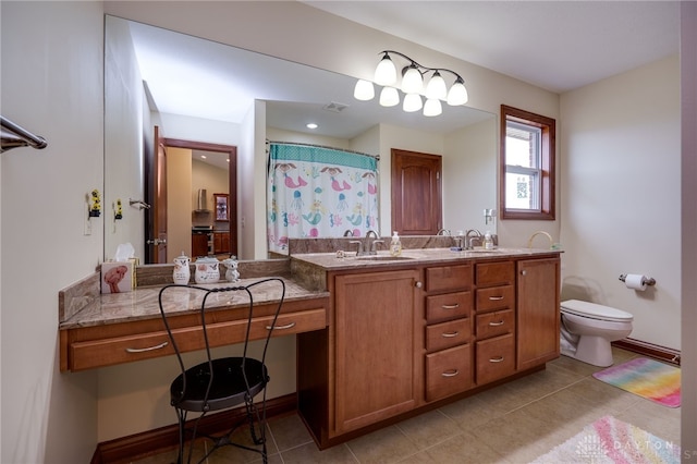 bathroom featuring vanity, tile patterned flooring, a shower with curtain, and toilet