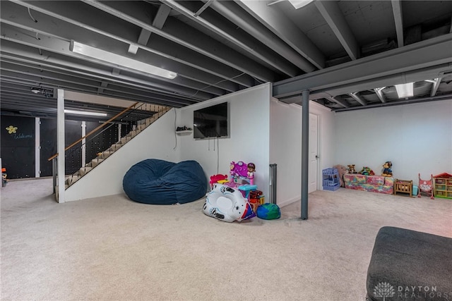 basement with carpet floors