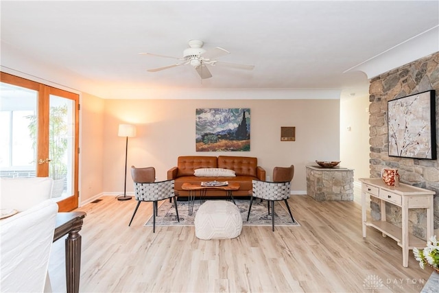 interior space featuring ceiling fan and light wood-type flooring