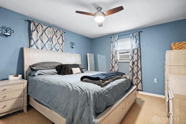 carpeted bedroom with cooling unit and ceiling fan