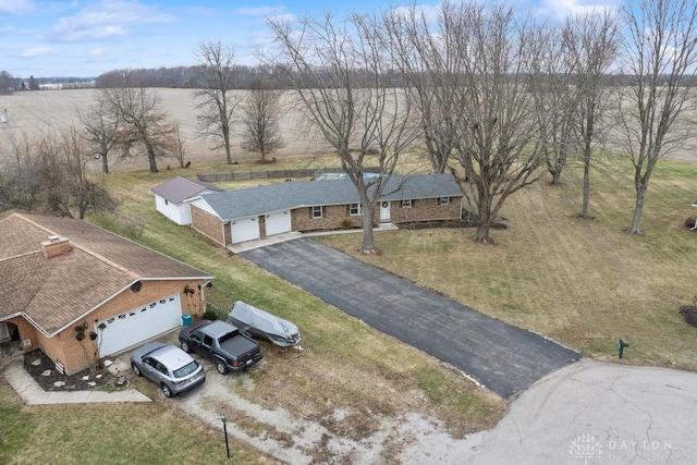 birds eye view of property featuring a rural view