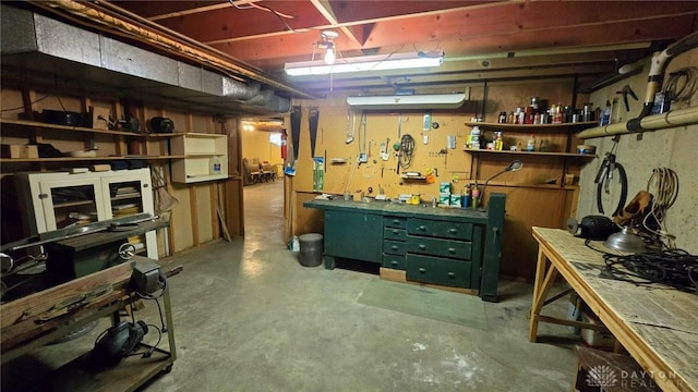 basement featuring a workshop area