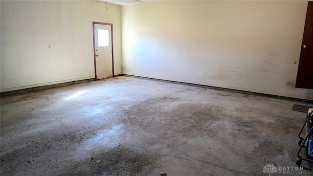 spare room featuring concrete floors